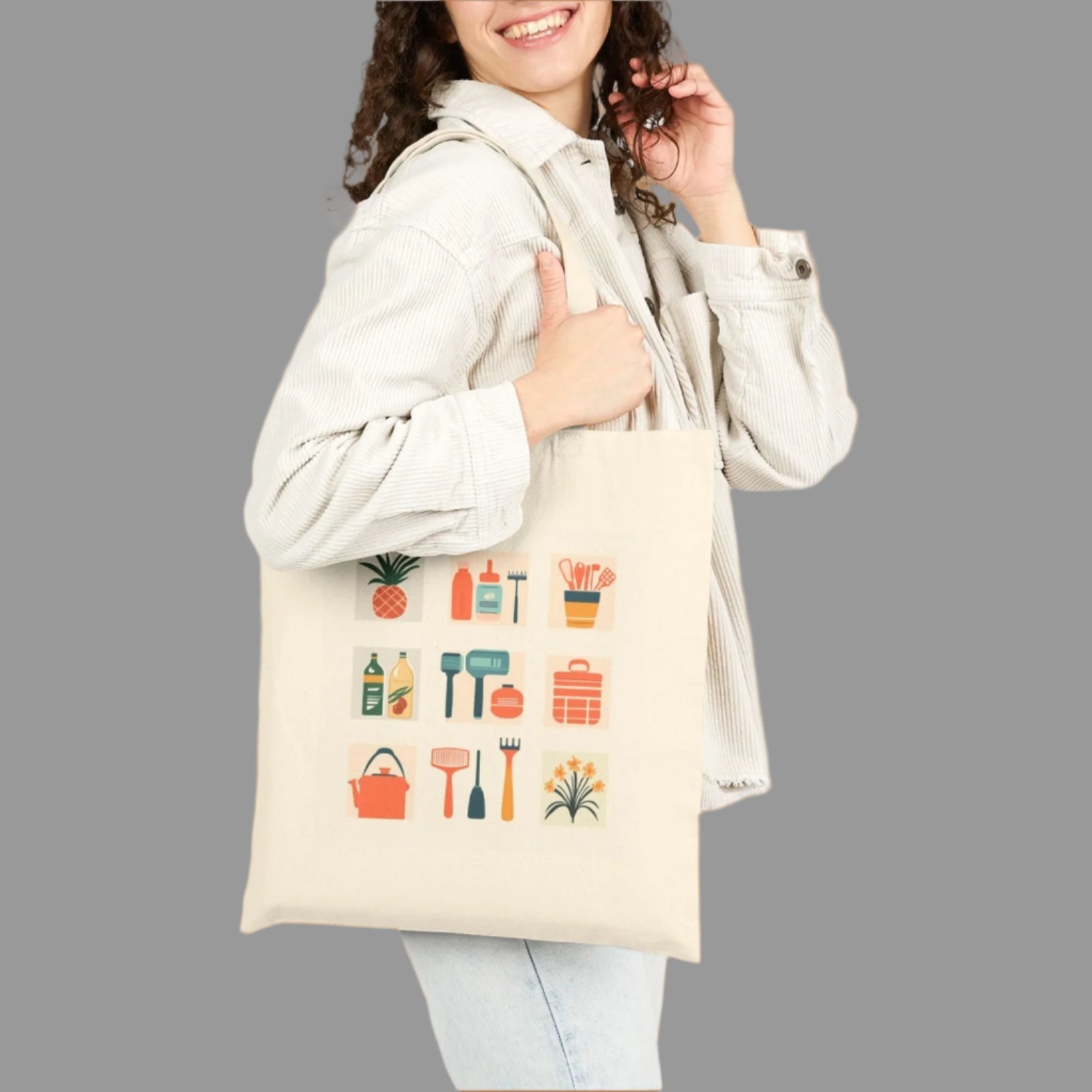 Woman holding a tote bag with gardening icons on a white background