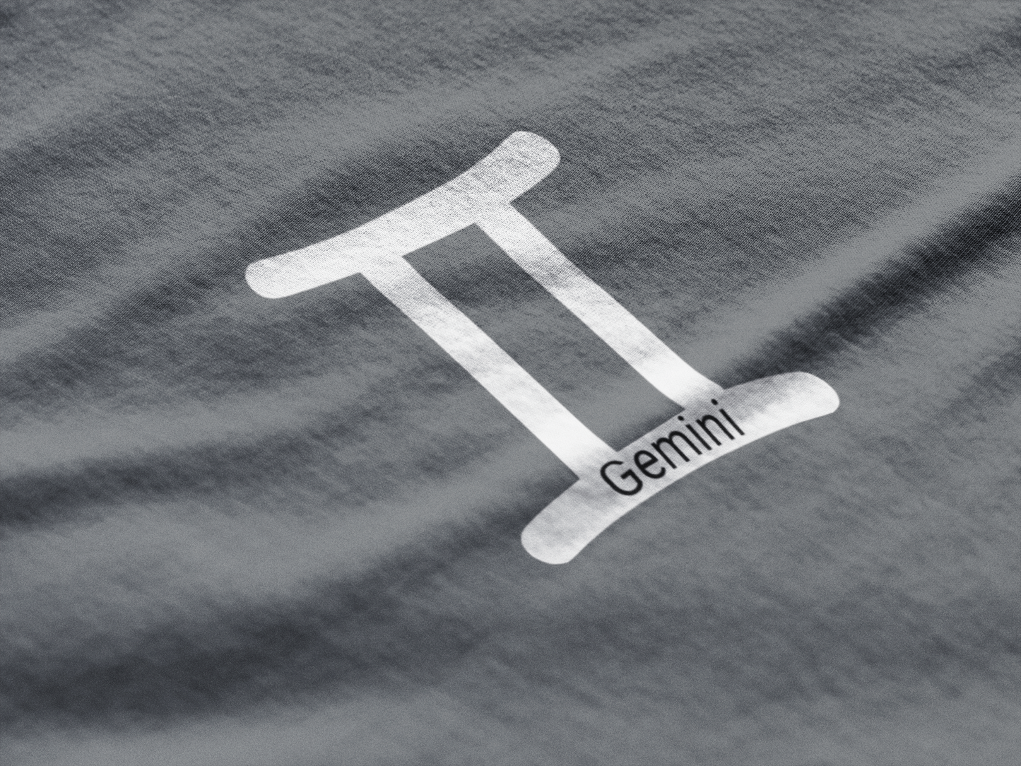 White Gemini zodiac symbol on a textured gray background