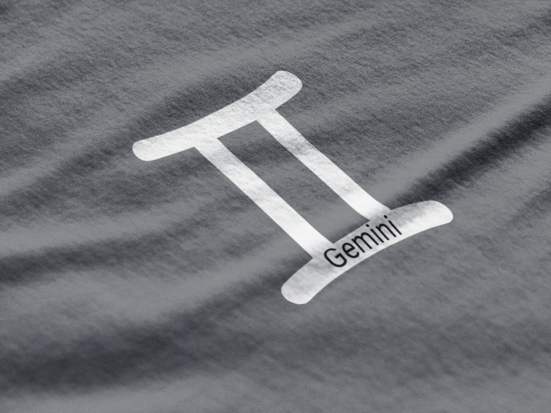 White Gemini zodiac symbol on a textured gray background