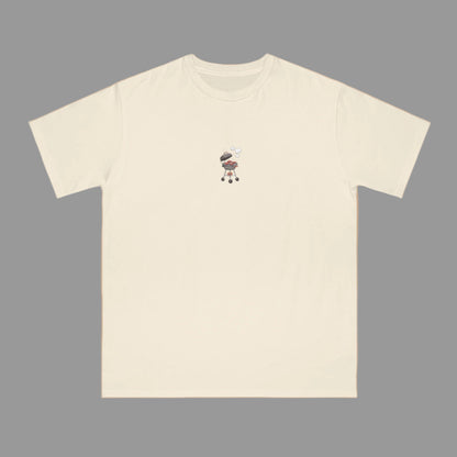 Beige t-shirt with a small graphic on a beige background