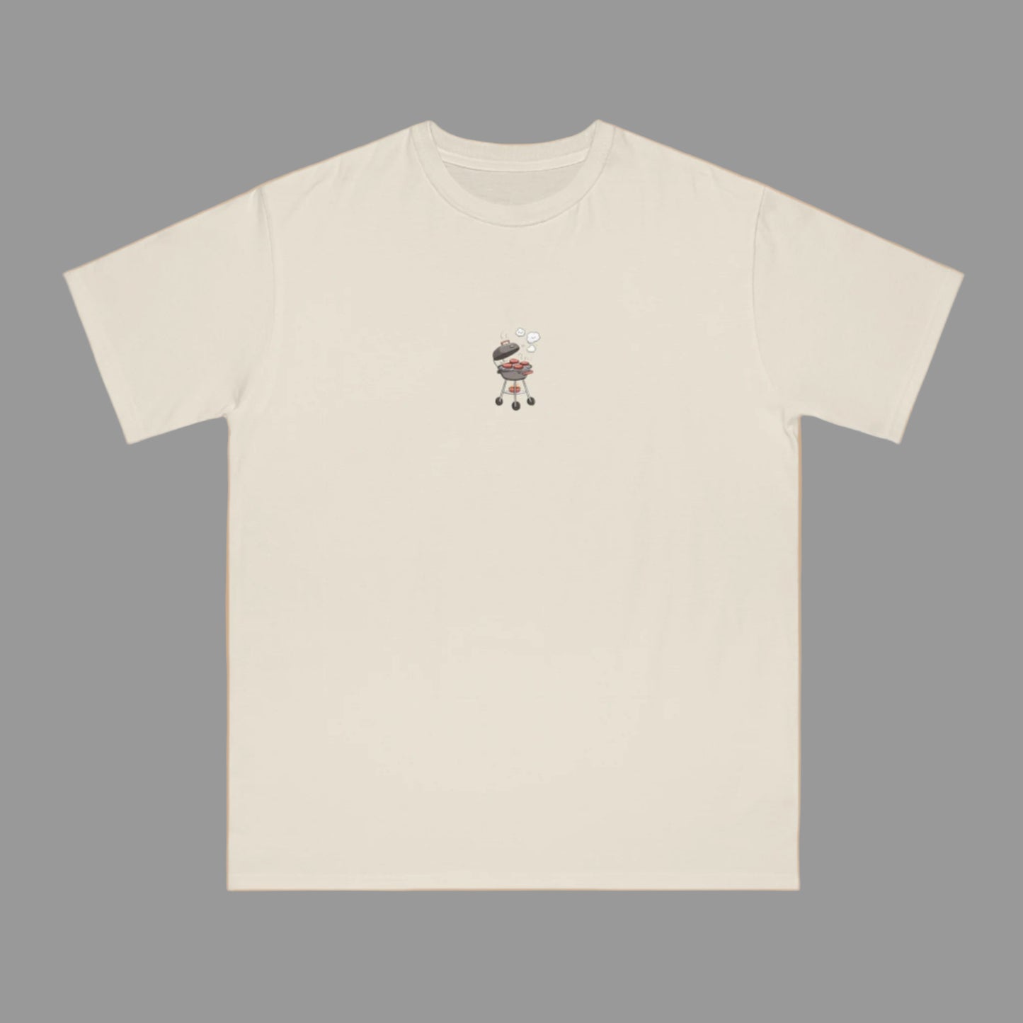 Beige t-shirt with a small graphic on a beige background