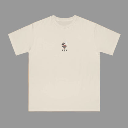 Beige t-shirt with a small graphic on a beige background