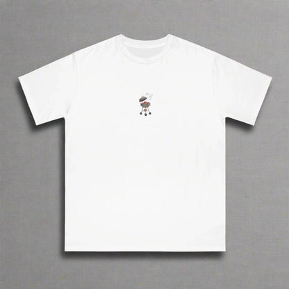 White t-shirt with a small embroidered design on a beige background