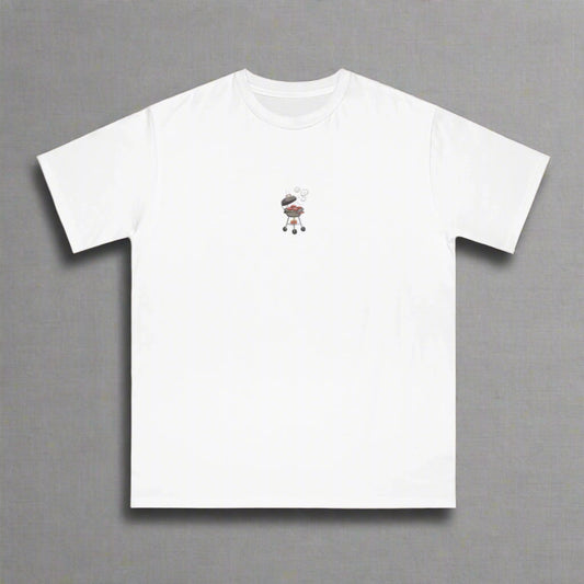 White t-shirt with a small embroidered design on a beige background