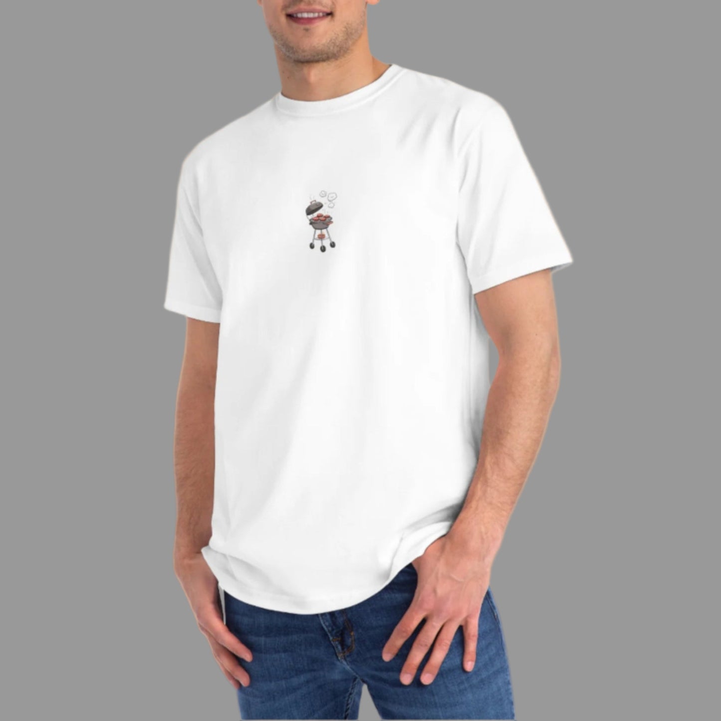 Man wearing a white t-shirt with a small graphic on a beige background