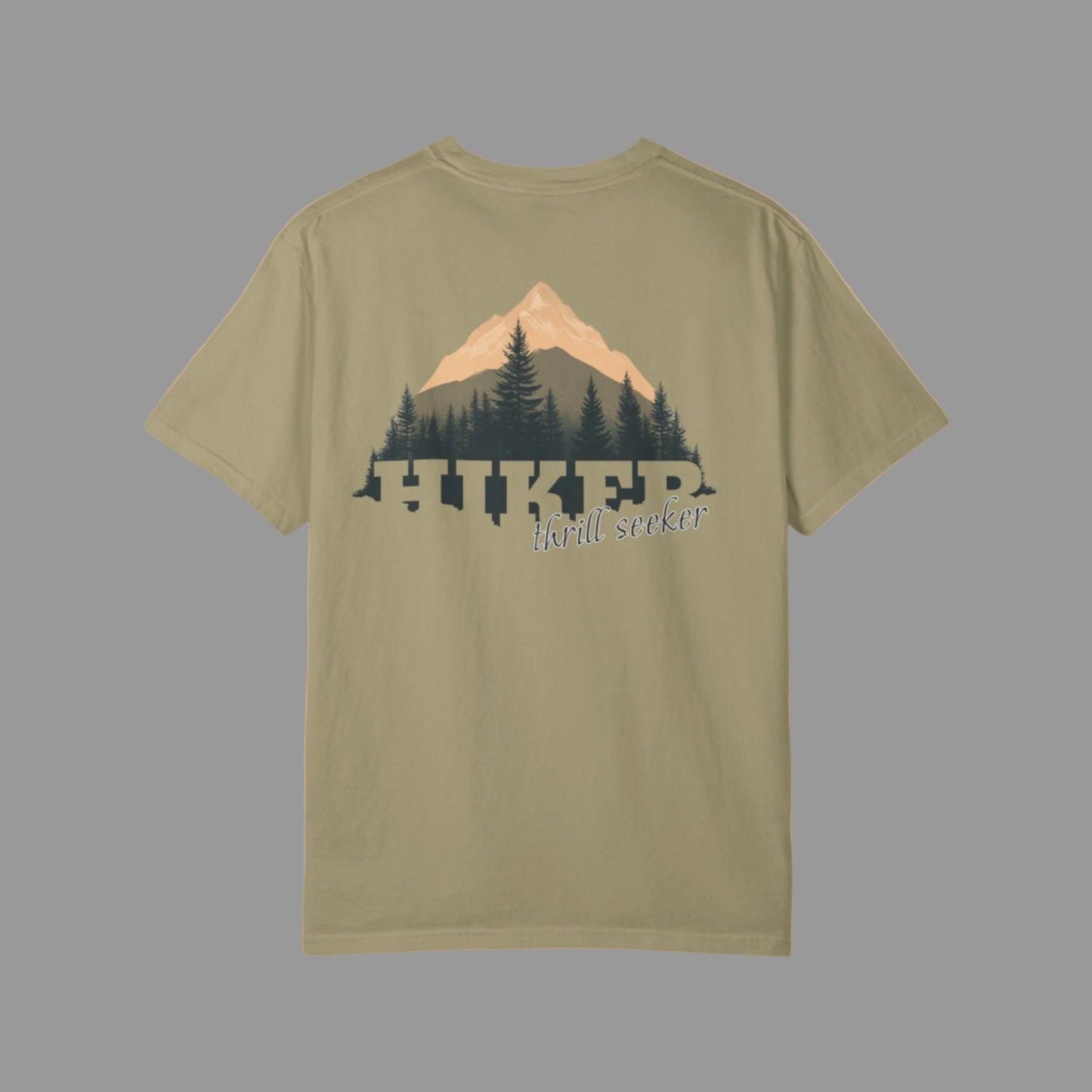 Olive green t-shirt with a mountain and tree design on the back, on a white background