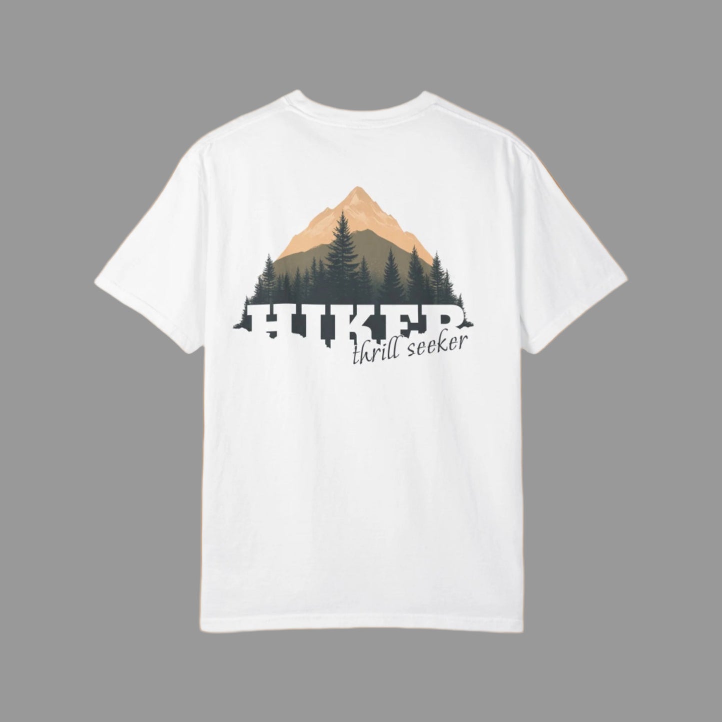 White t-shirt with mountain graphic and 'thrill seeker' text on a white background