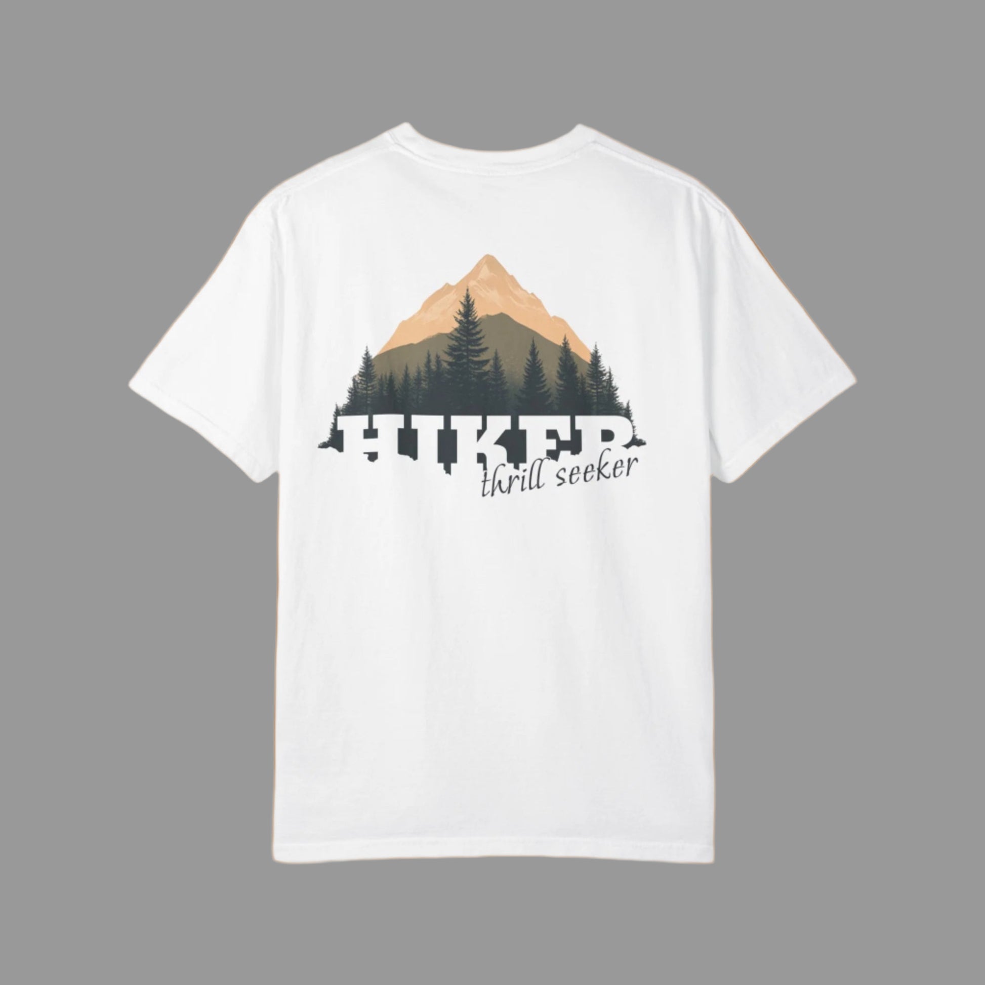 White t-shirt with mountain graphic and 'thrill seeker' text on a white background