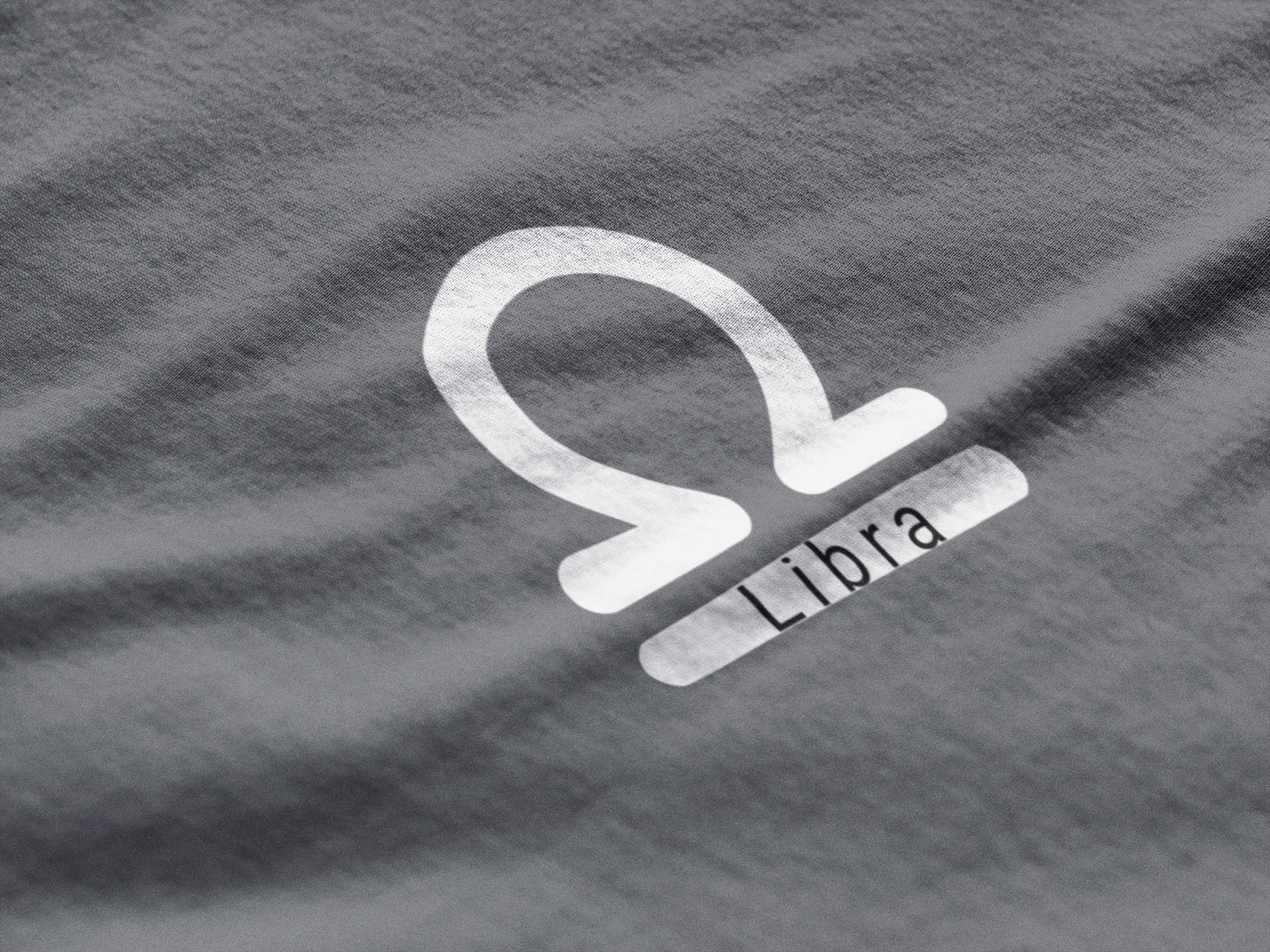 Libra logo on a textured gray background