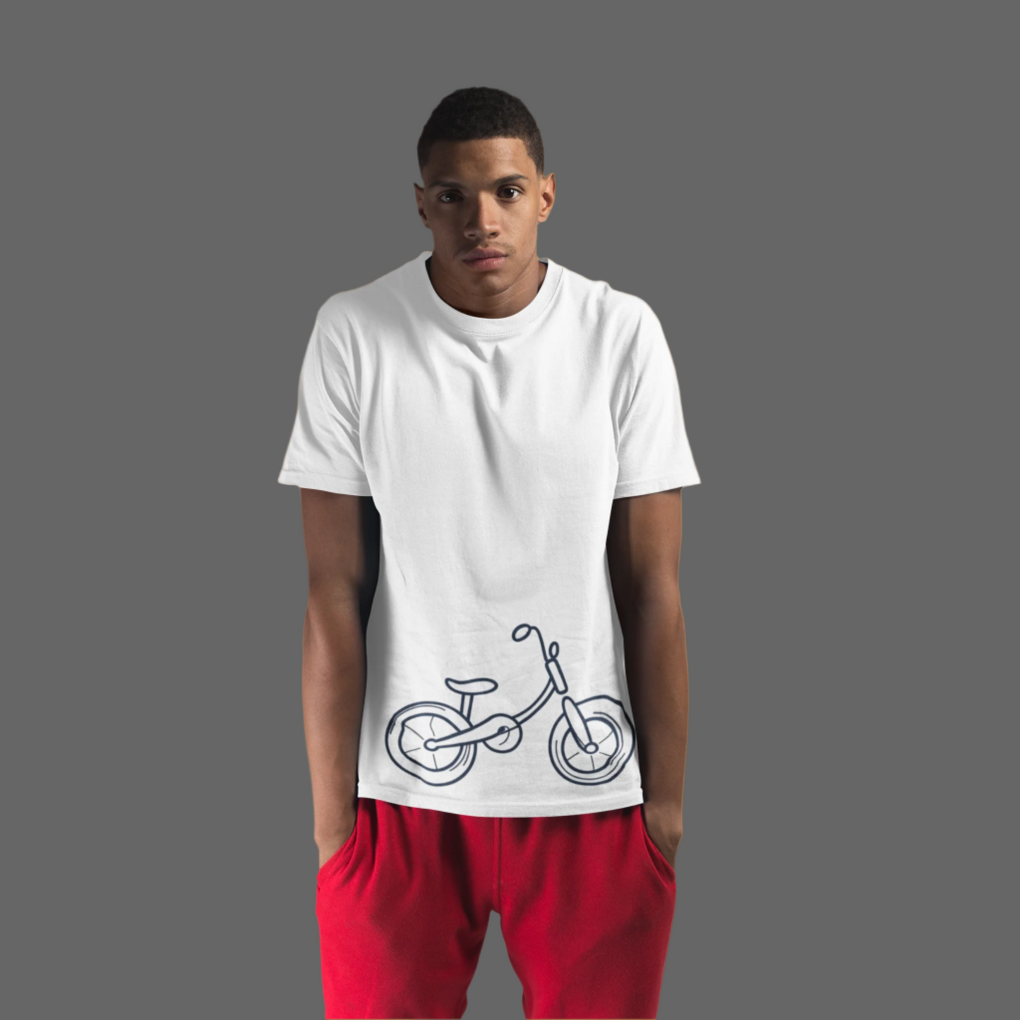 Person wearing a white t-shirt with a bicycle design on a light blue background