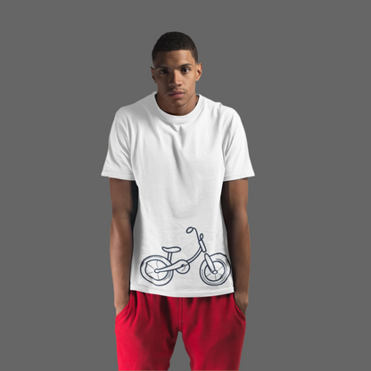 Person wearing a white t-shirt with a bicycle design on a light blue background