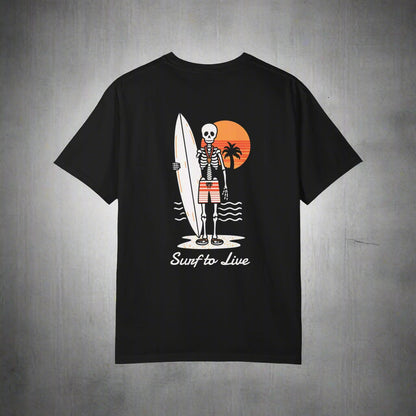 Black t-shirt with a skeleton holding a surfboard design on a white background
