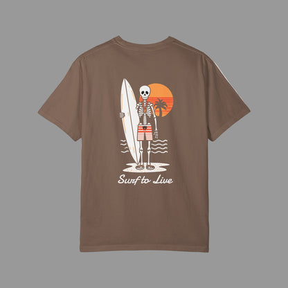 Brown t-shirt with a skeleton holding a surfboard design on the back, set against a white background.