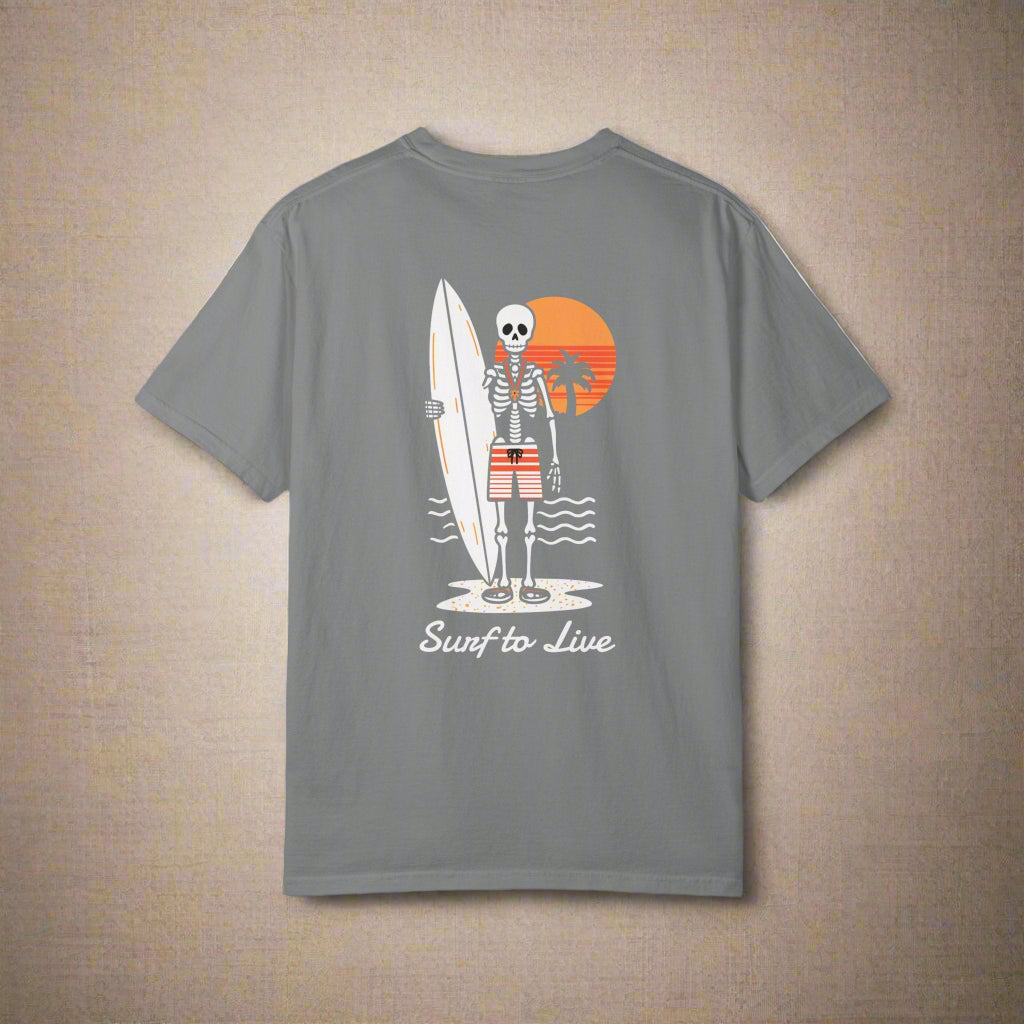 Gray t-shirt with a skeleton holding a surfboard and beach ball design on the back, against a white background.