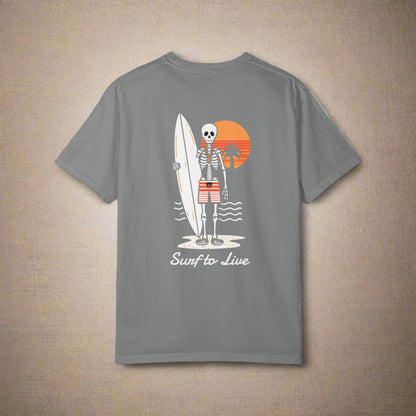 Gray t-shirt with a skeleton holding a surfboard and beach ball design on the back, against a white background.