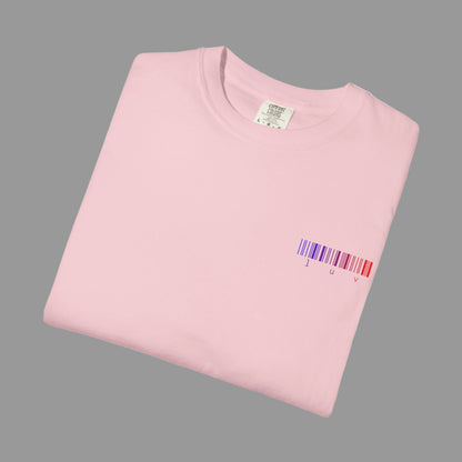 Folded pink t-shirt with a barcode design on a white background