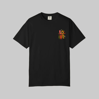 Black t-shirt with colorful 'LOVE' design on a white background