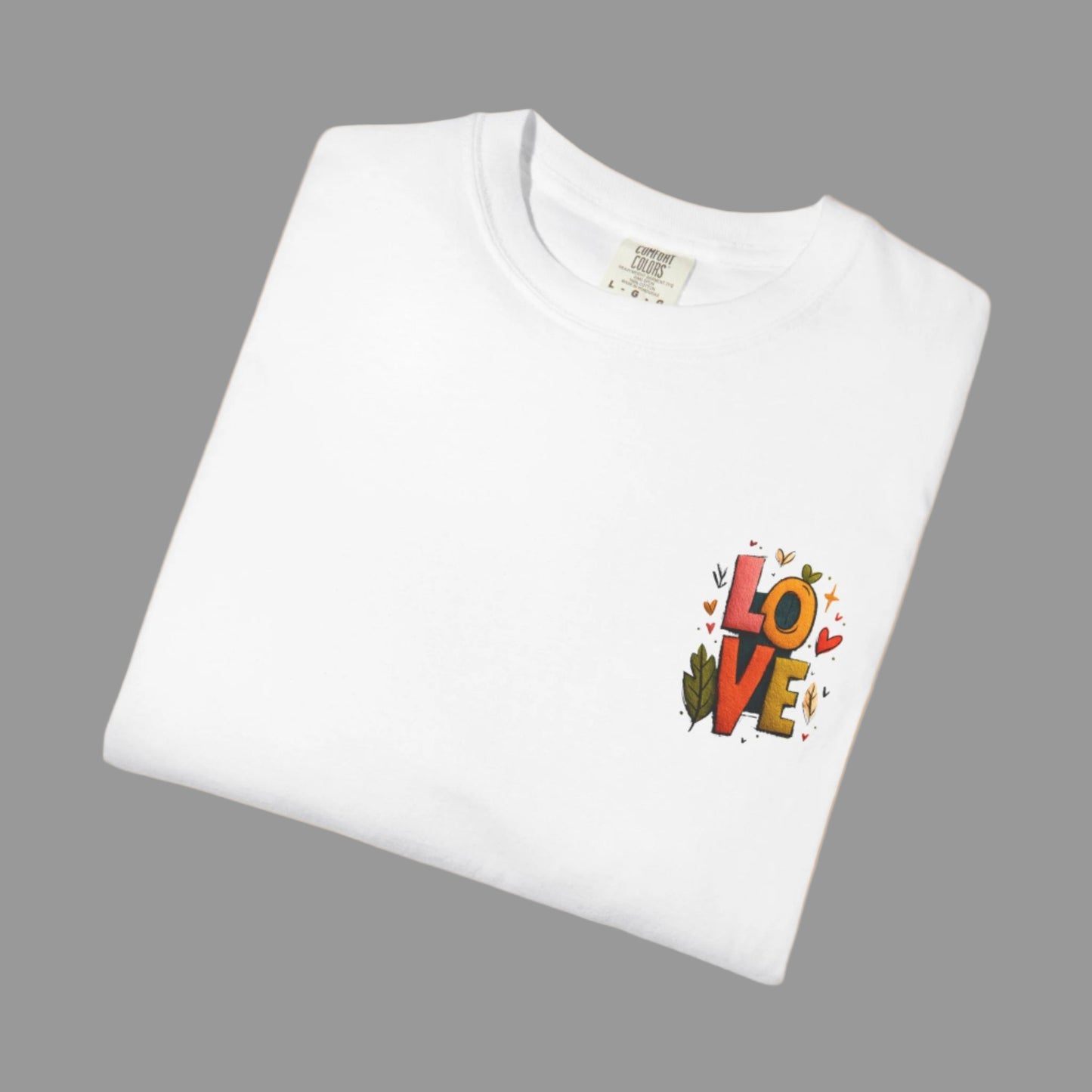White t-shirt with colorful 'LOVE' design on a white background