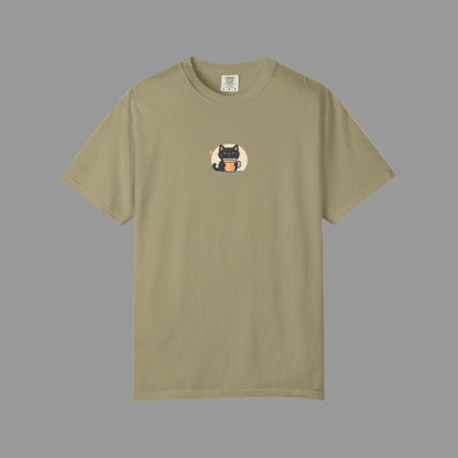 Khaki t-shirt with a small graphic of a cat on a white background