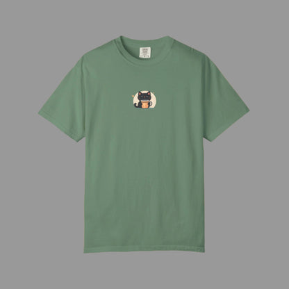 Green t-shirt with a small graphic on a white background