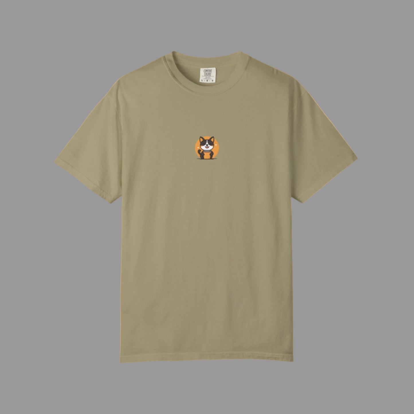 Beige t-shirt with a small dog graphic on a white background