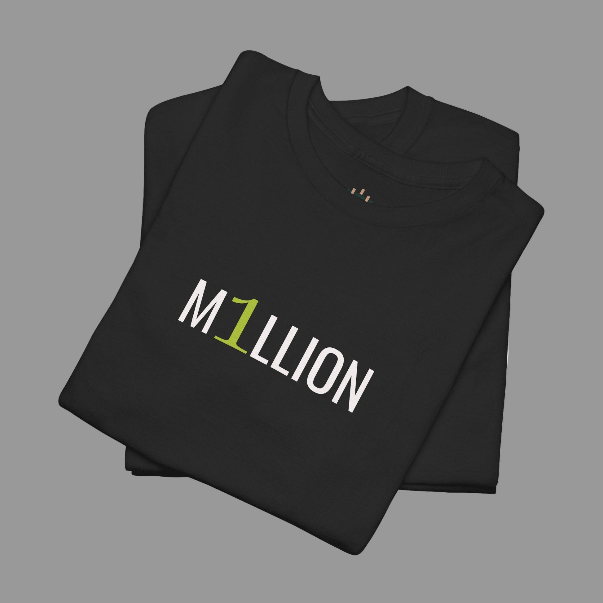 Black t-shirt with 'M1Llion' printed on it, folded and displayed against a white background
