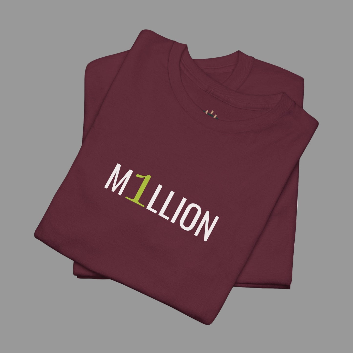 Folded maroon t-shirt with 'M1Llion' text on a white background