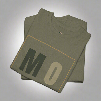 Folded green t-shirt with 'MO' print on a white background
