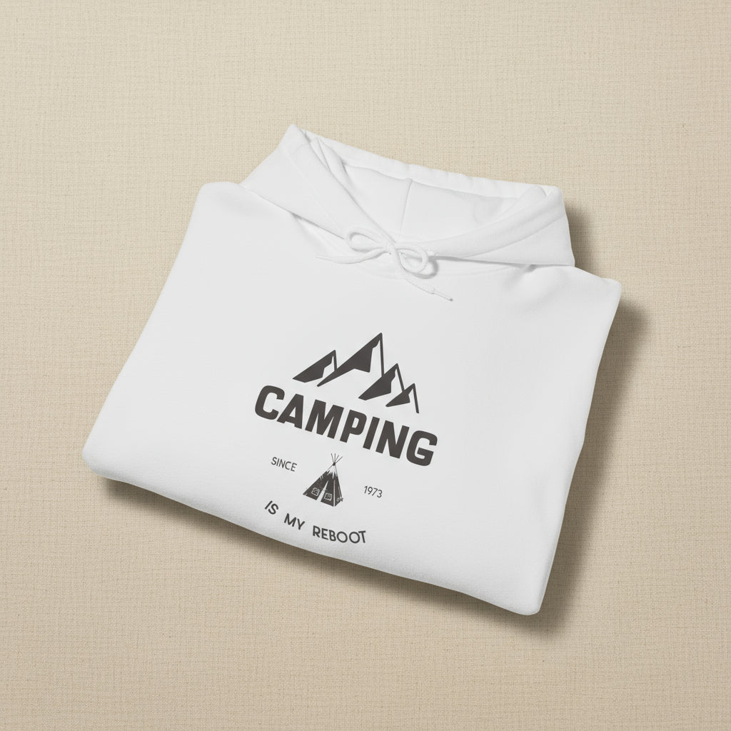 Folded gray hoodie with 'Camping is my reboot' text and mountain graphic on a white background