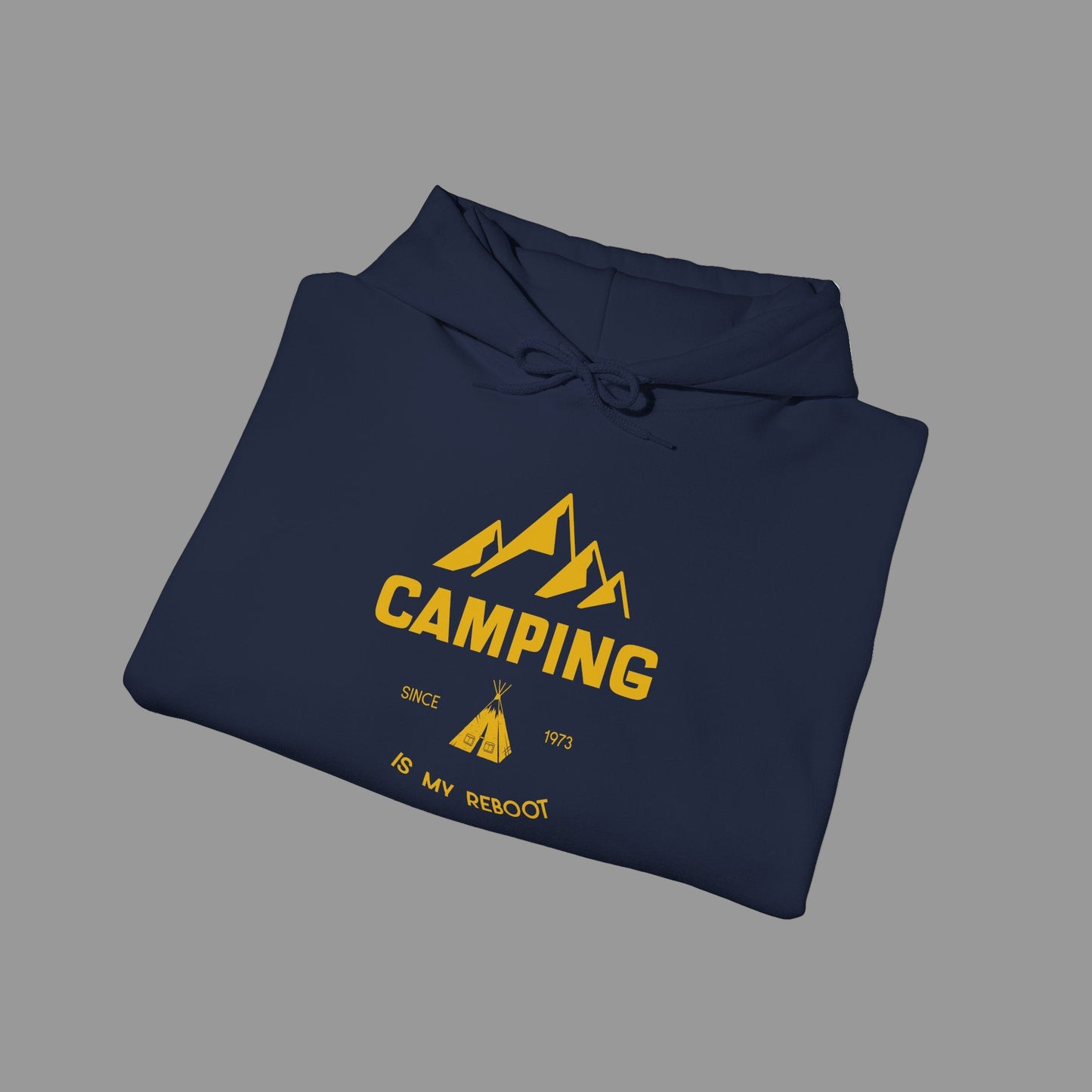 Folded navy hoodie with yellow 'Camping' graphic on a white background