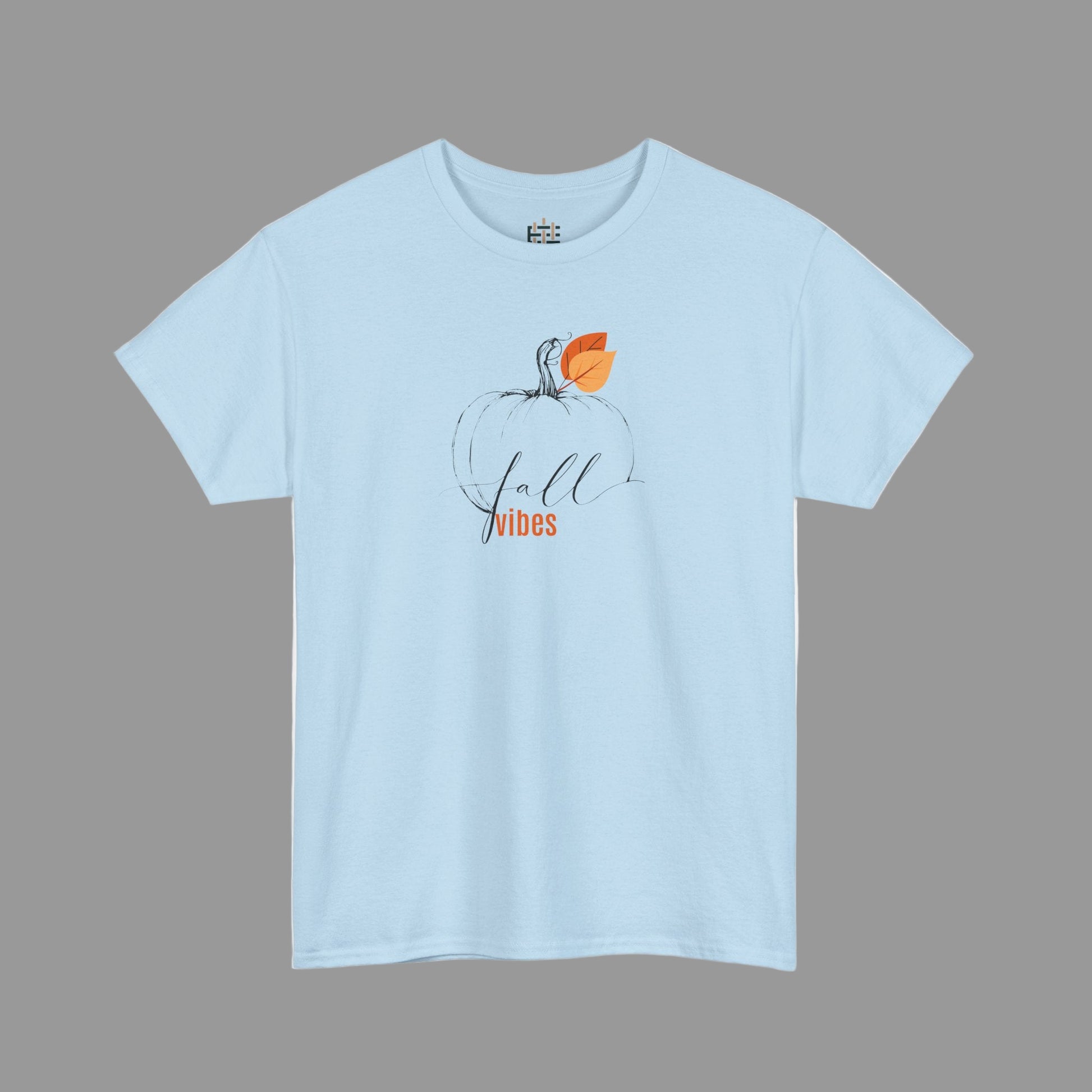 Light blue t-shirt with a pumpkin and 'fall vibes' text on a white background
