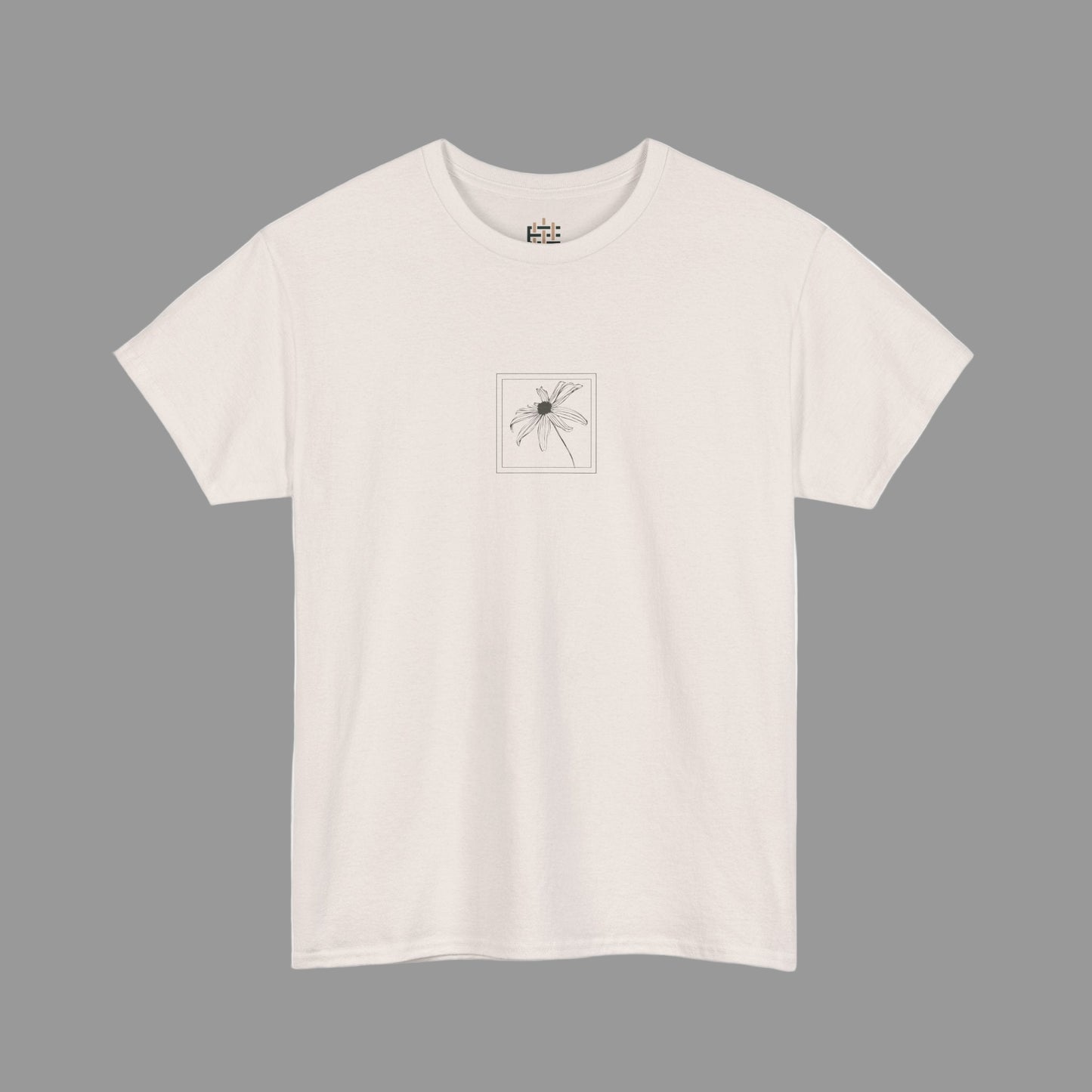 Beige t-shirt with a small graphic on a white background