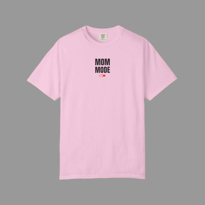 Pink t-shirt with 'Mom Mode' text on a white background