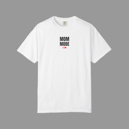 White t-shirt with 'Mom Mode' text on a white background
