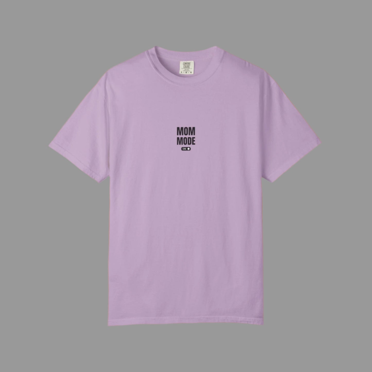 Purple t-shirt with 'MOM MODE' text on a white background