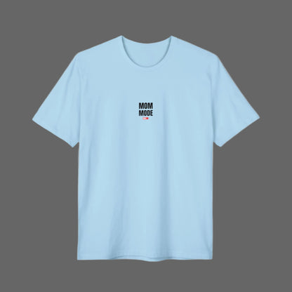 A woman wearing a black crew neck t-shirt with the text 'MOM MODE' on the front.