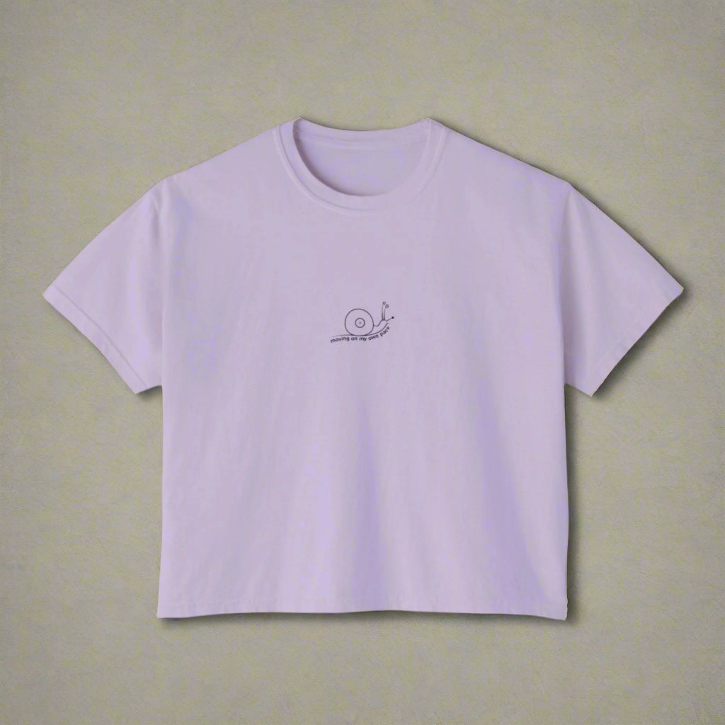 Lavender t-shirt with a small logo on a white background