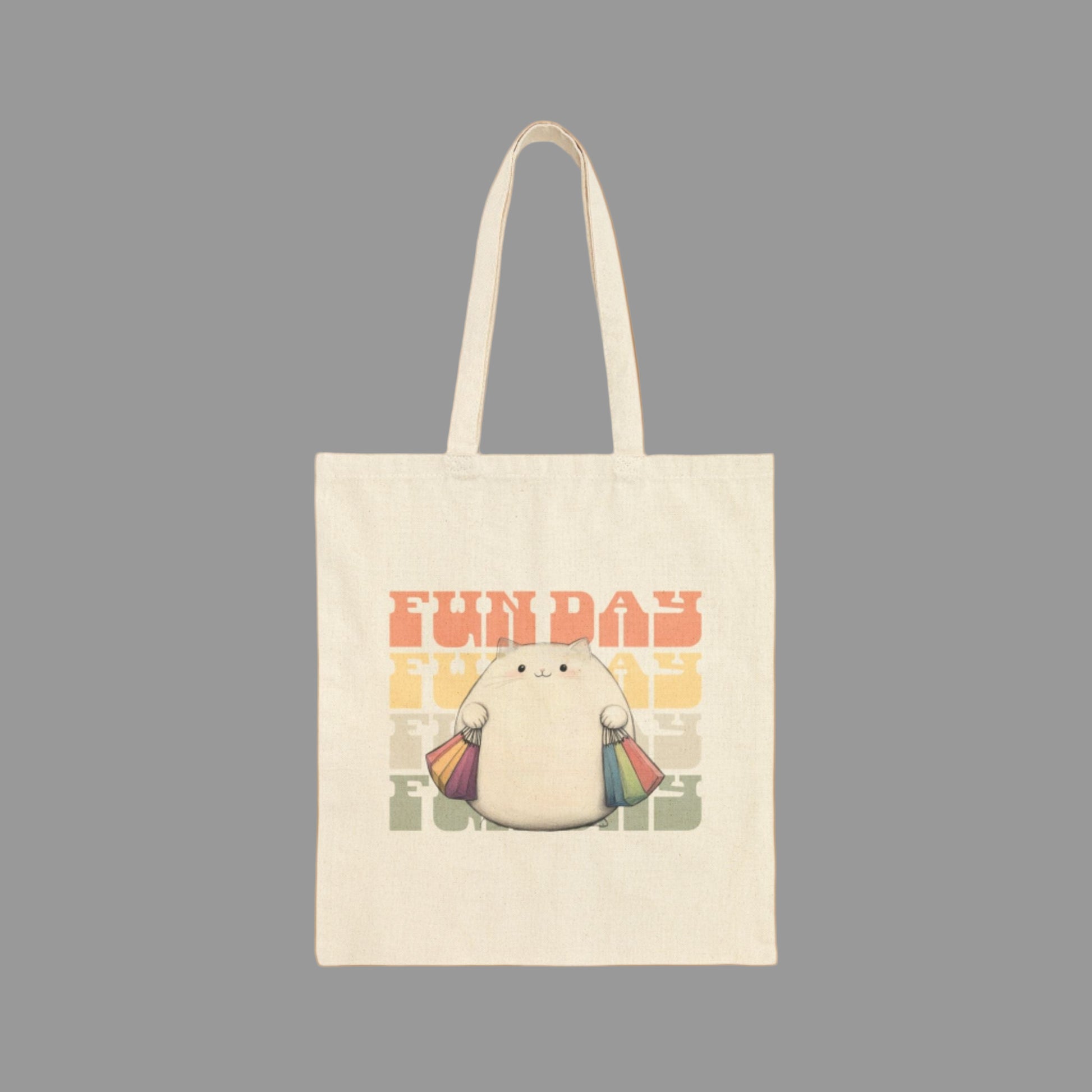 Tote bag with a cartoon character holding a rainbow umbrella and 'FUN DAY' text on a white background