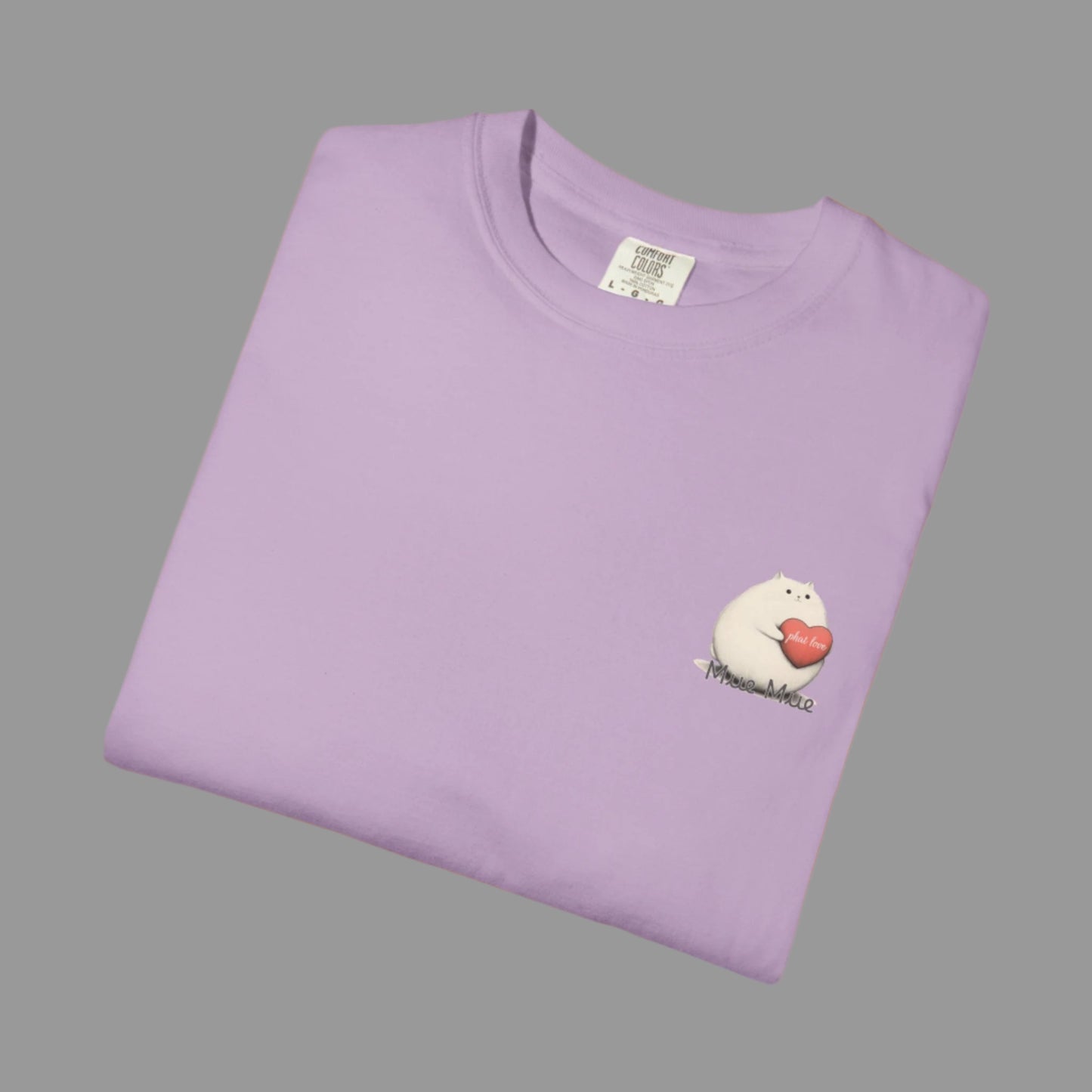 Folded purple t-shirt with a small graphic on a white background