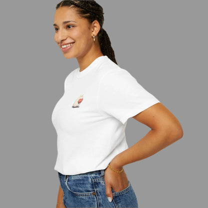 Woman wearing a white t-shirt with a small graphic on a white background
