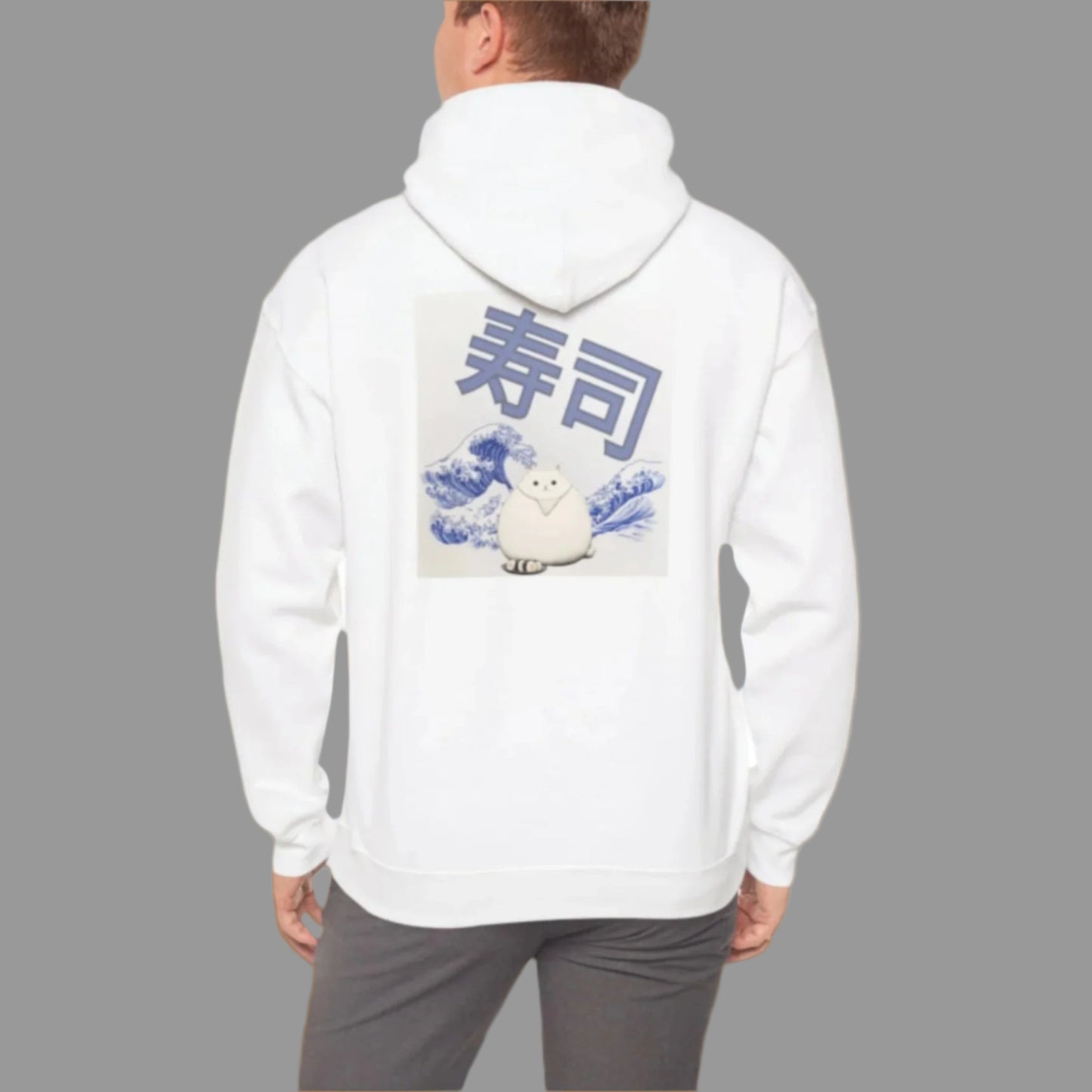 A person wearing a white hoodie with a graphic print of a cat and Japanese characters on the back.