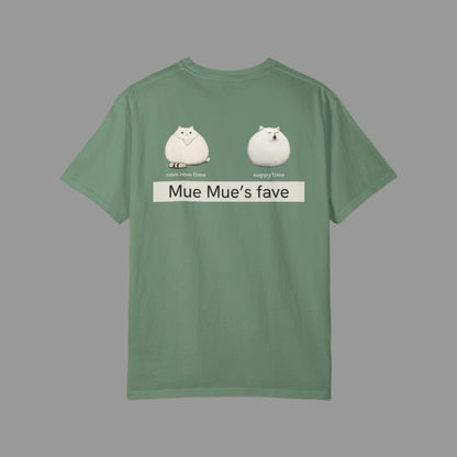 Green t-shirt with cartoon characters and text on a white background