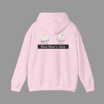 A person wearing a white hoodie with a graphic design on the back, featuring two cartoon cats and the text 'Mue Mue's fave'.