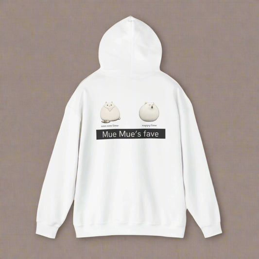A person wearing a white hoodie with a graphic design on the back, featuring two cartoon cats and the text 'Mue Mue's fave'.