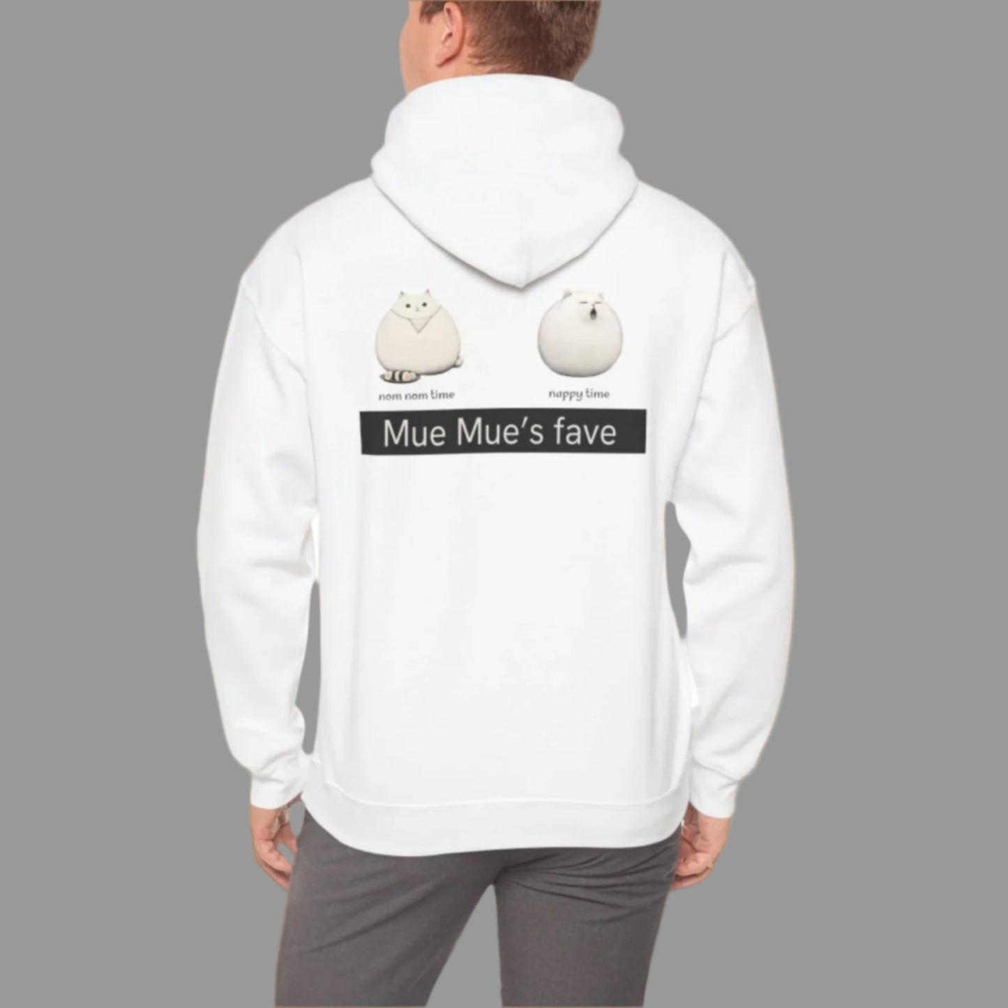 A person wearing a white hoodie with a graphic design on the back, featuring two cartoon cats and the text 'Mue Mue's fave'.