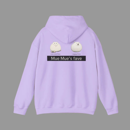 A person wearing a white hoodie with a graphic design on the back, featuring two cartoon cats and the text 'Mue Mue's fave'.