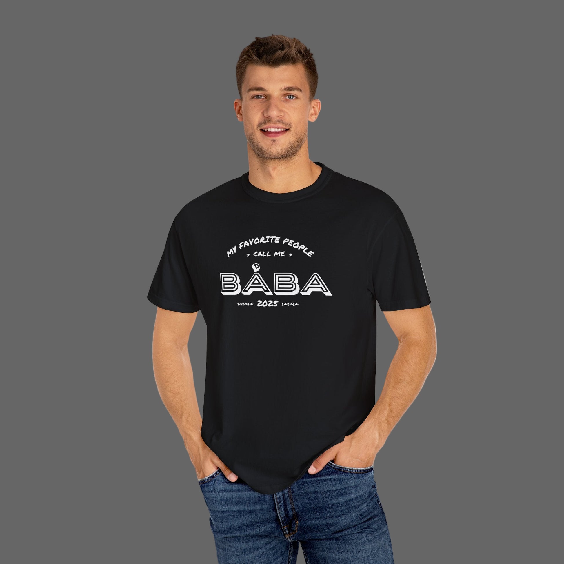 Man wearing a black t-shirt with text design on a white background