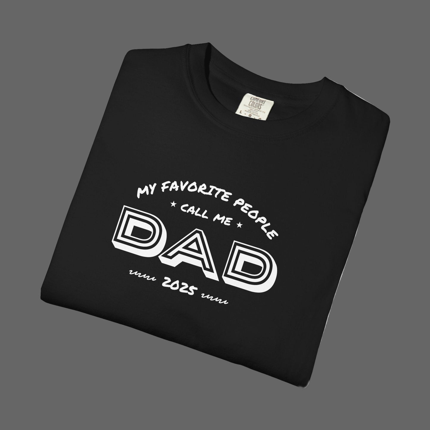 Black t-shirt with white text 'My favorite people call me Dad since 2023' on a white background