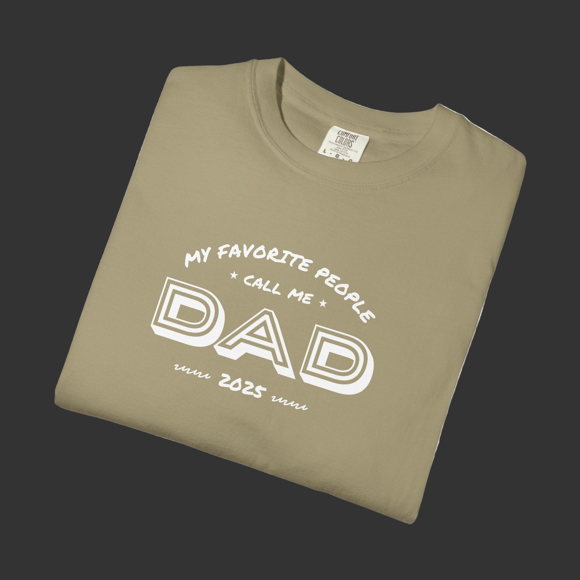 Folded khaki t-shirt with white text on a white background