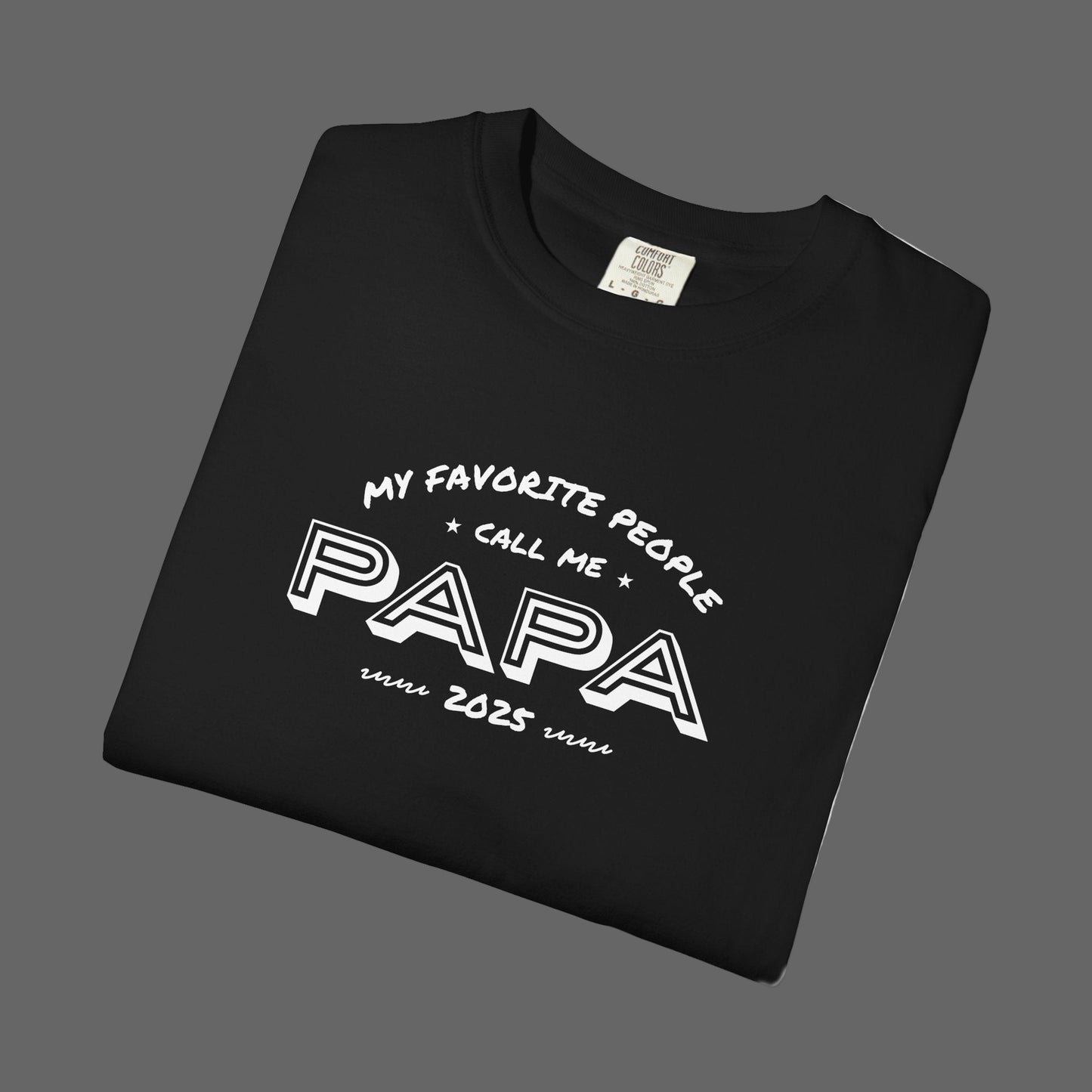 Black t-shirt with 'My favorite people call me papa 2025' text on a white background